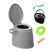 Gray portable toilet with cleaning tools on a white background