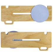 Top and underside views of the wooden patient transfer board, showing the blue rotating seat disc, central sliding slot, integrated handle, and underside sliding mechanism.